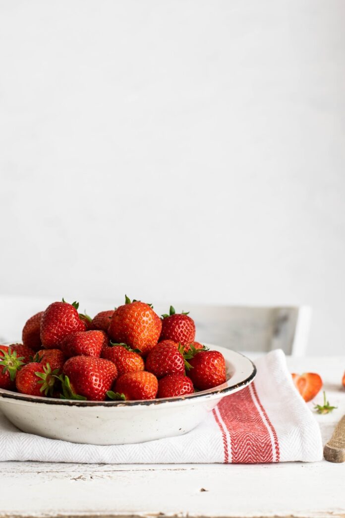Photo by Monika Grabkowska bowl of strawberries