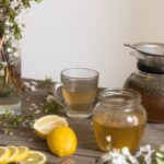 바쁜 일상 속, 나만의 웰니스 루틴으로 균형 찾아가기 clear glass pitcher with lemon juice