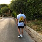 “작은 변화, 큰 여유”… 일상 속 스트레스 관리법 뜬다 man walking on road beside trees